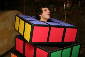 Man dressed in full body Rubik's Cube costume