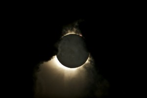 Total eclipse, partially obscured by cloud