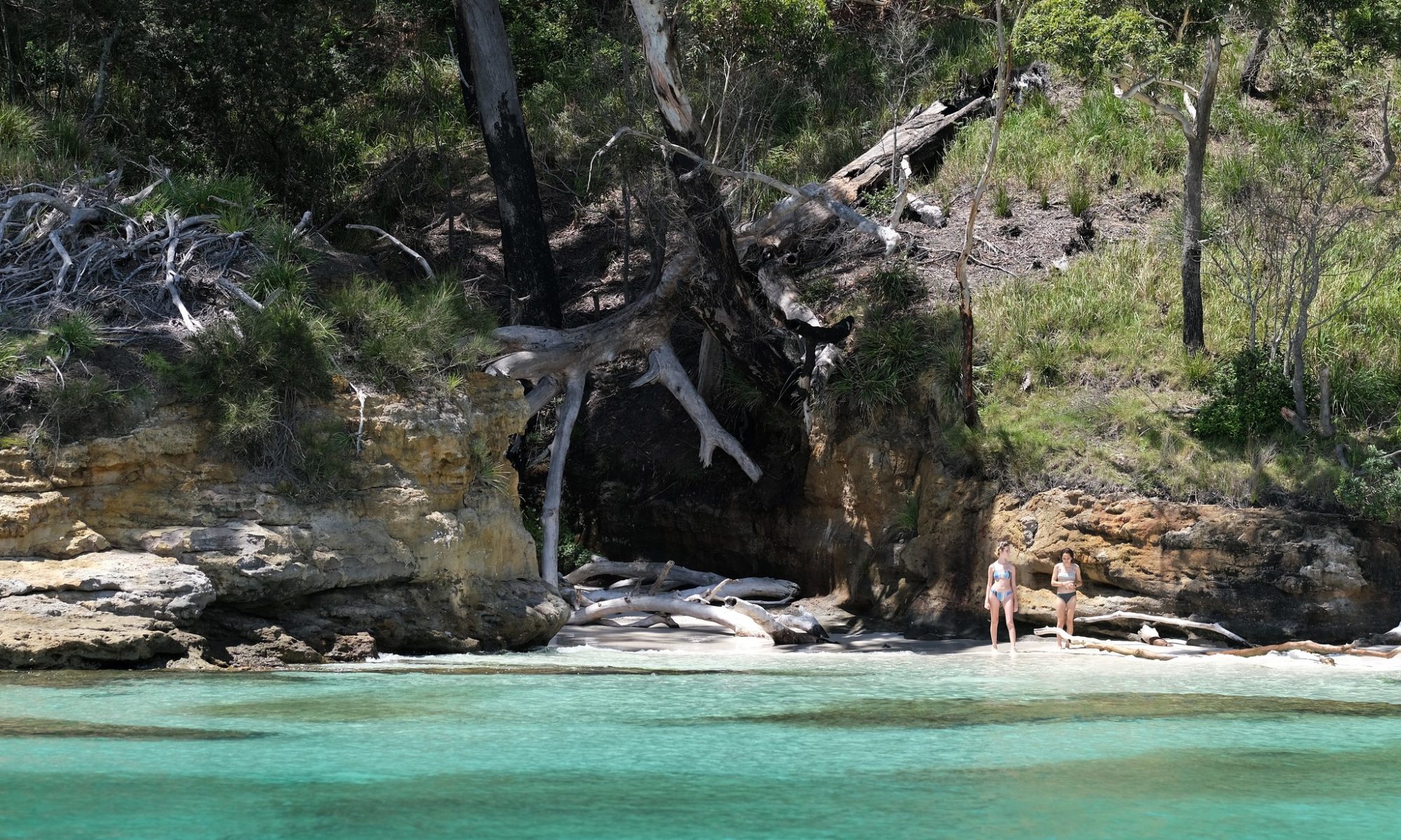 Women in the distance on Murray's Beach, Jervis Bay